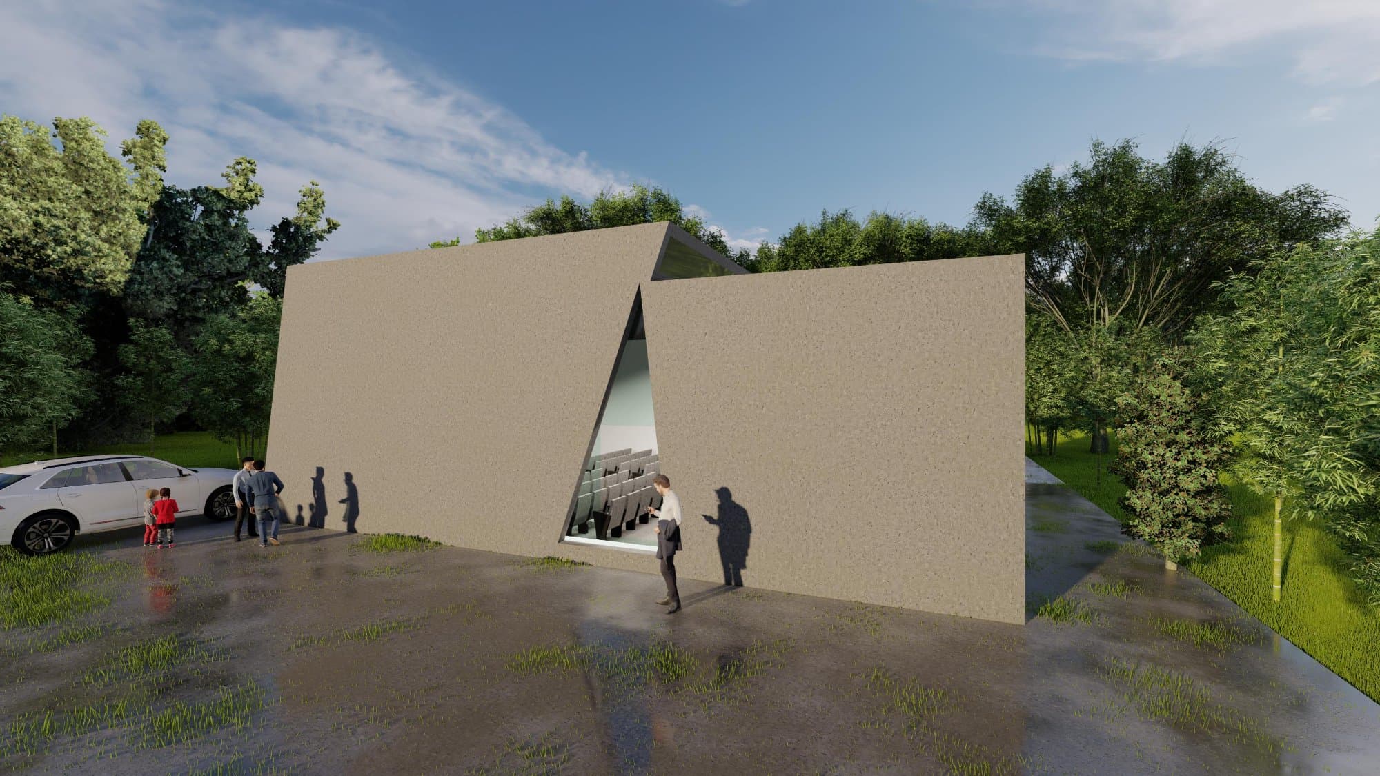 Approach to the auditorium — the entrance opens between two leaning walls