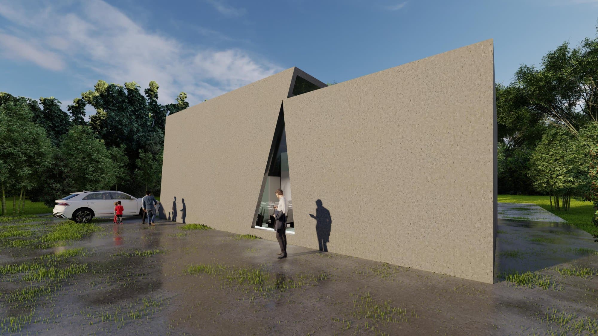 The Saketham mini auditorium — two leaning concrete walls amid trees